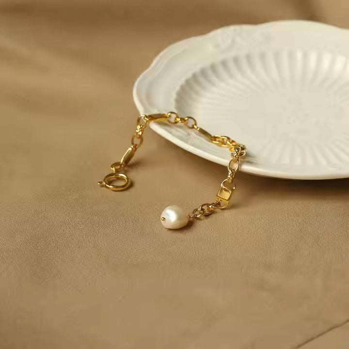 GOLD AND PEARL BRACELET