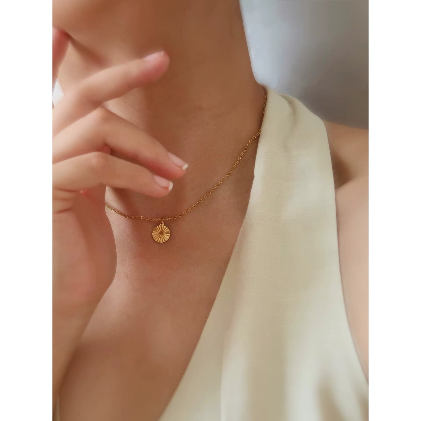 GOLD SUN COIN NECKLACE