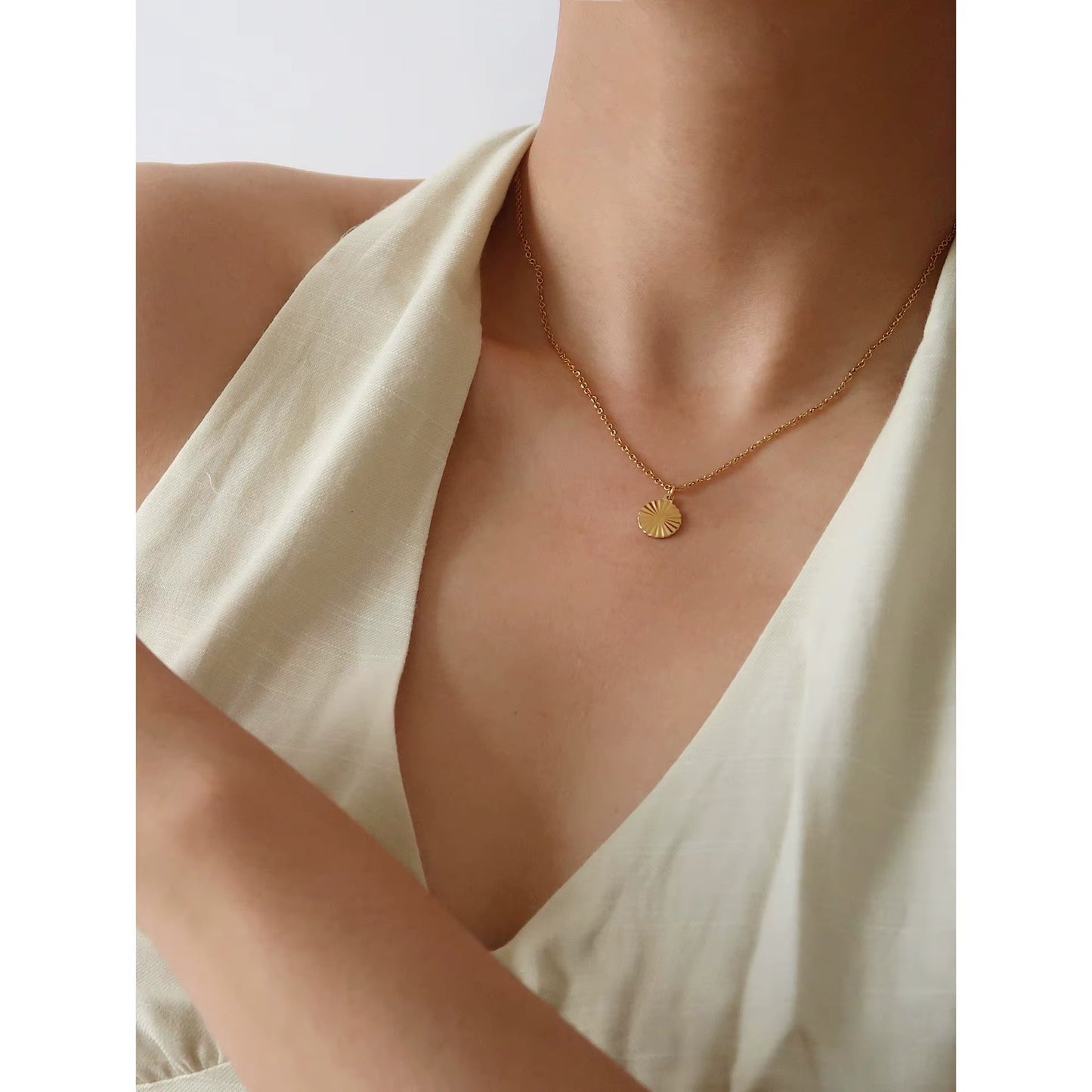 GOLD SUN COIN NECKLACE