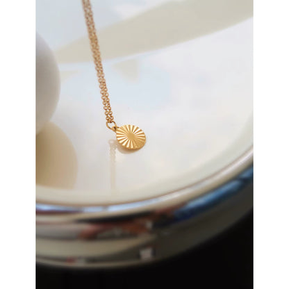 GOLD SUN COIN NECKLACE