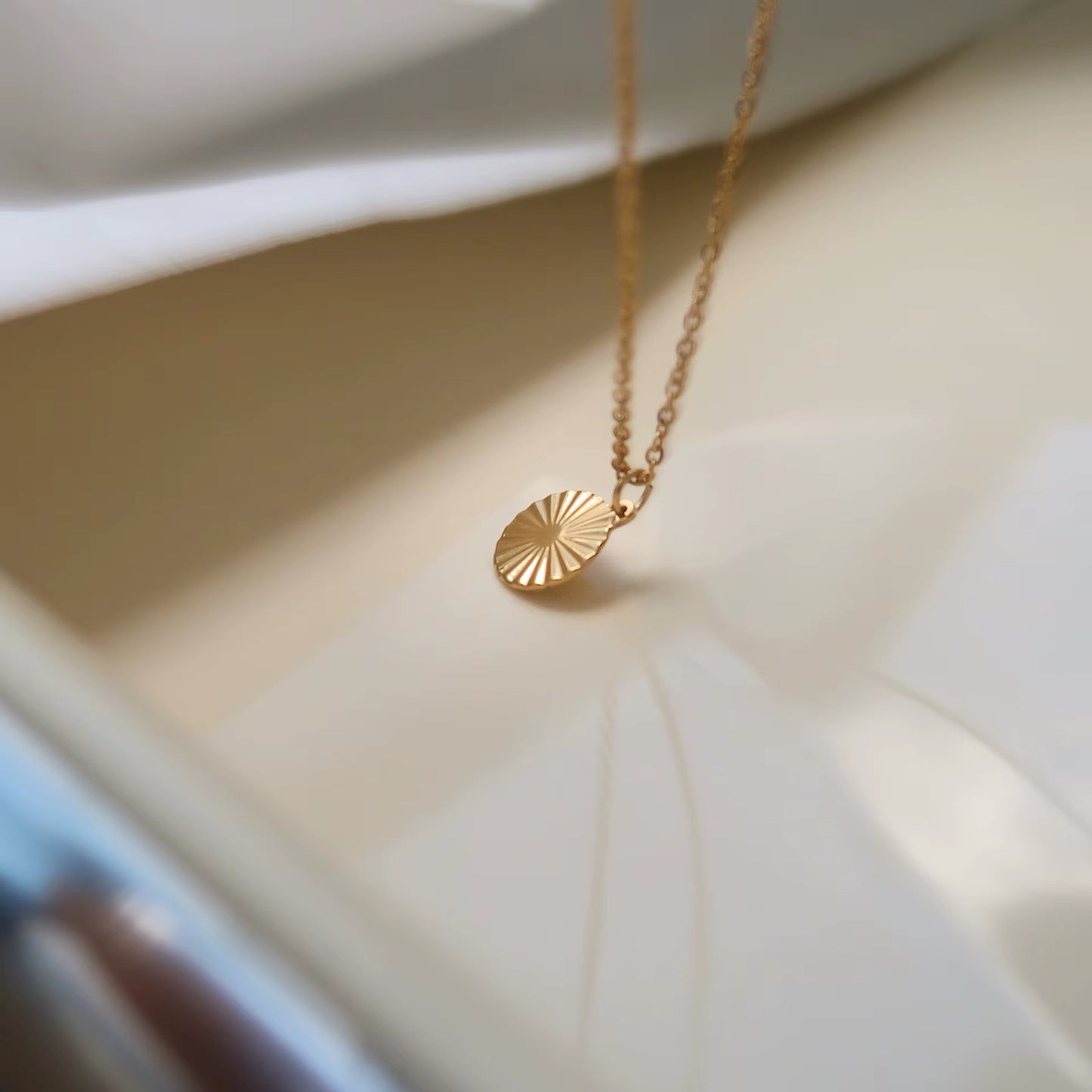 GOLD SUN COIN NECKLACE