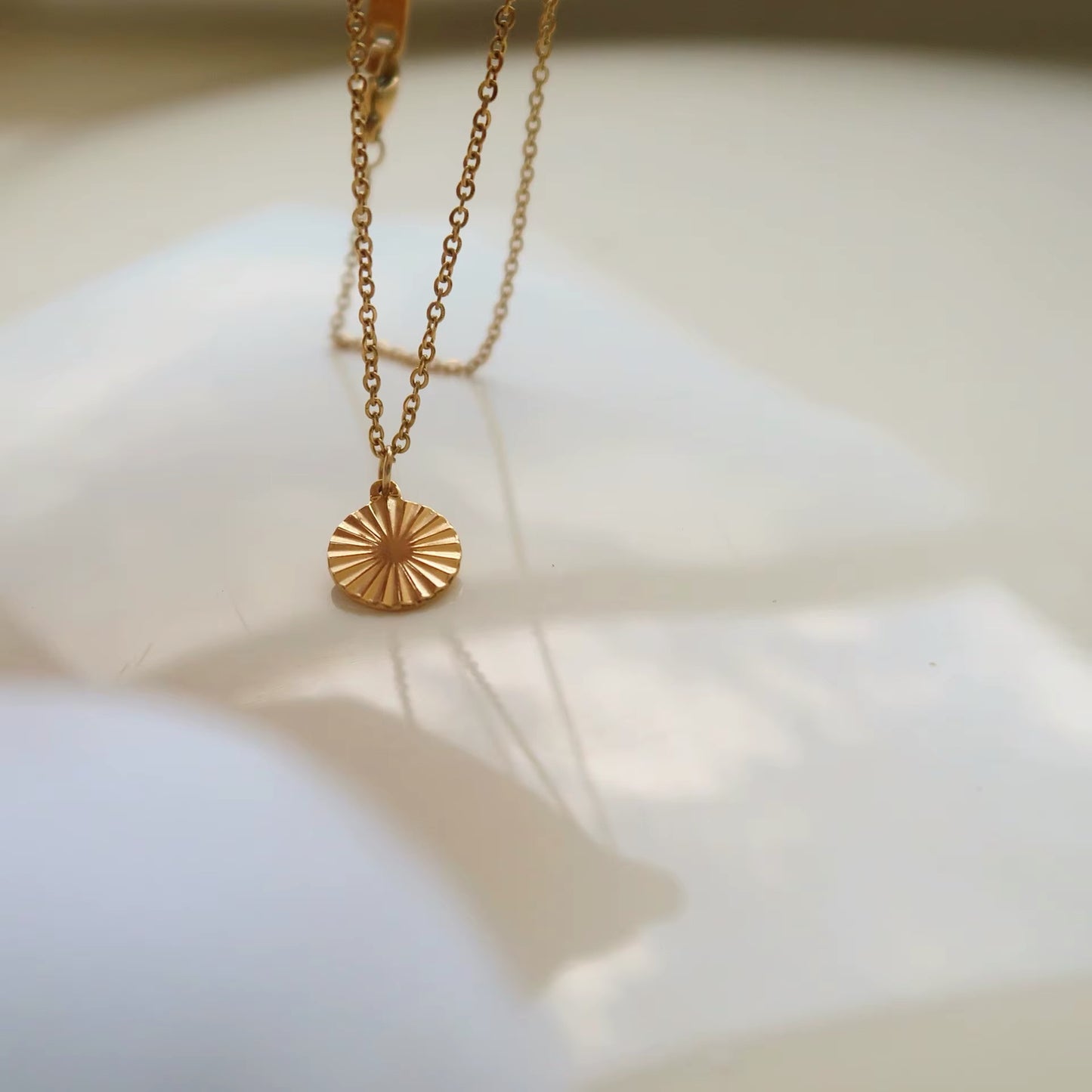 GOLD SUN COIN NECKLACE