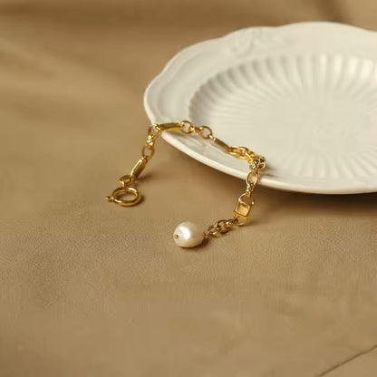 GOLD AND PEARL BRACELET